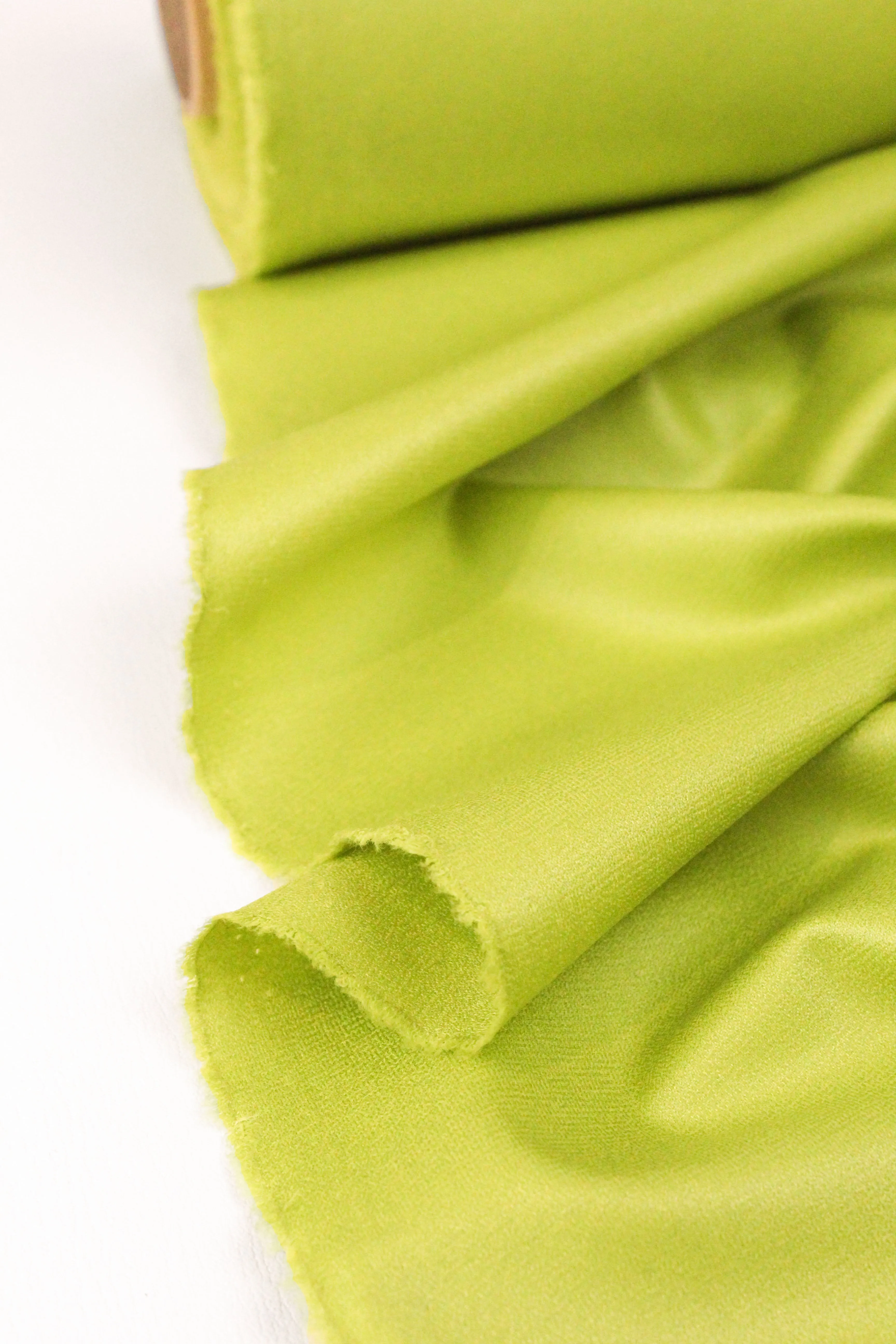 Lime Liquid Finish Crepe Suiting Fabric - Premium Quality for Stylish Couture