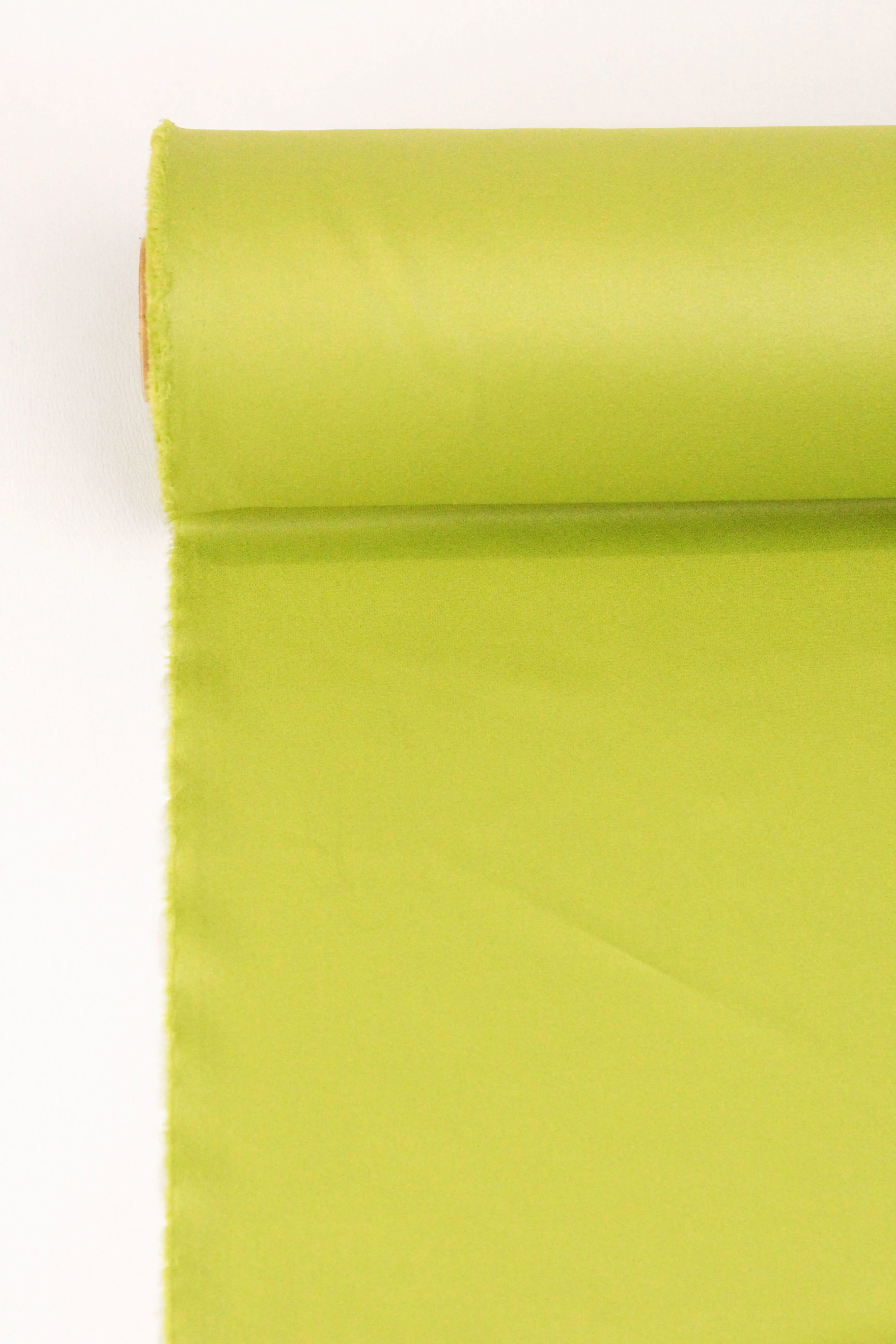 Lime Liquid Finish Crepe Suiting Fabric - Premium Quality for Stylish Couture