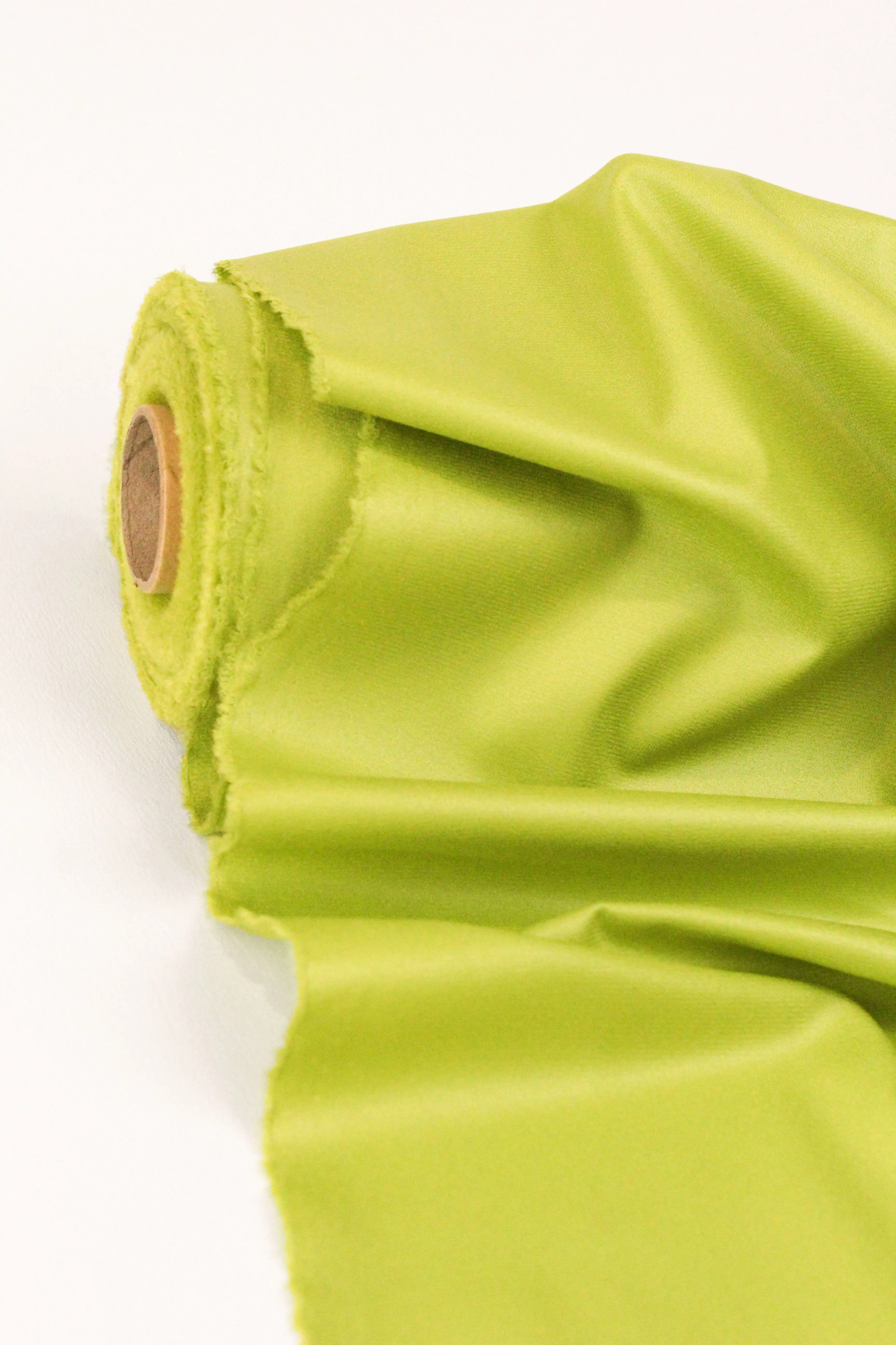 Lime Liquid Finish Crepe Suiting Fabric - Premium Quality for Stylish Couture